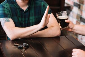 What Is Alcohol Use Disorder (AUD)? Signs, Symptoms, and Solutions